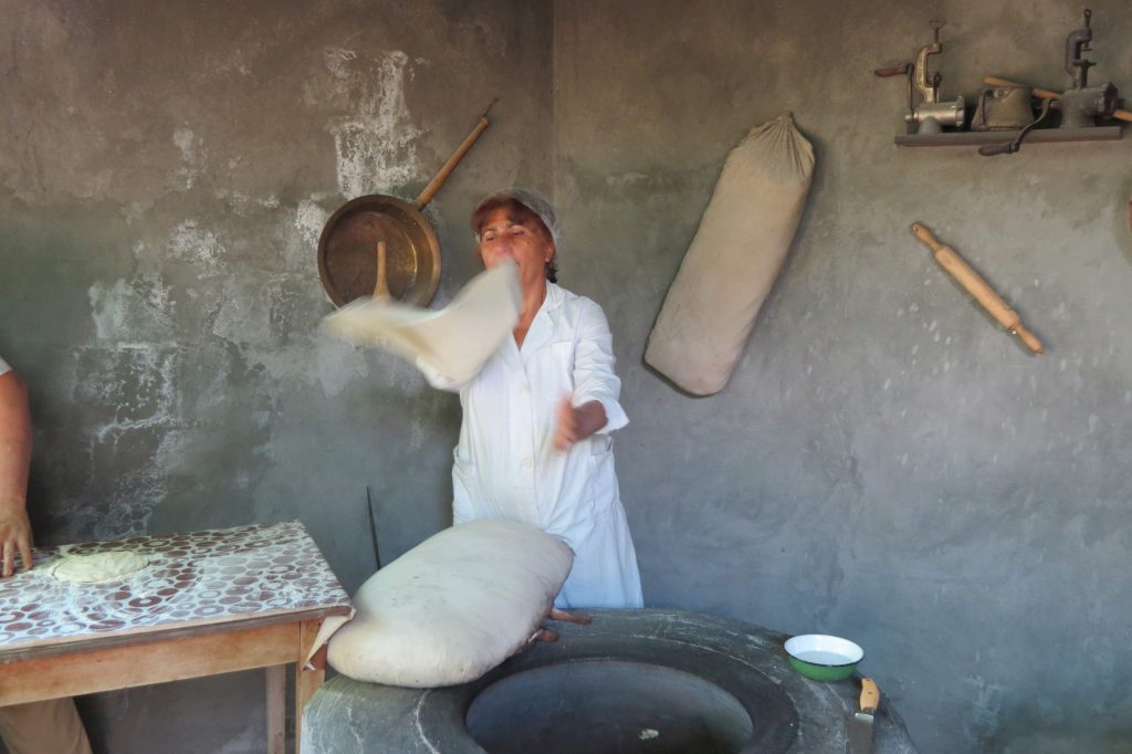 Making the traditional lavash bread in Armenia