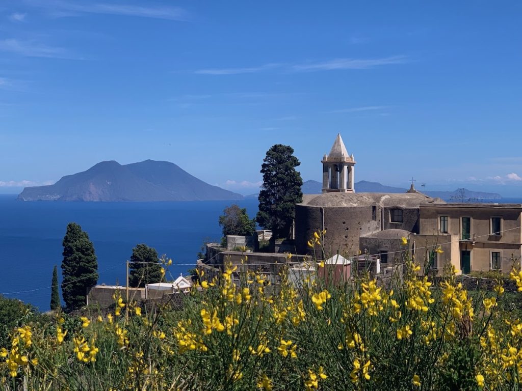 Church of Santo Stefano Filicudi with view of Salina