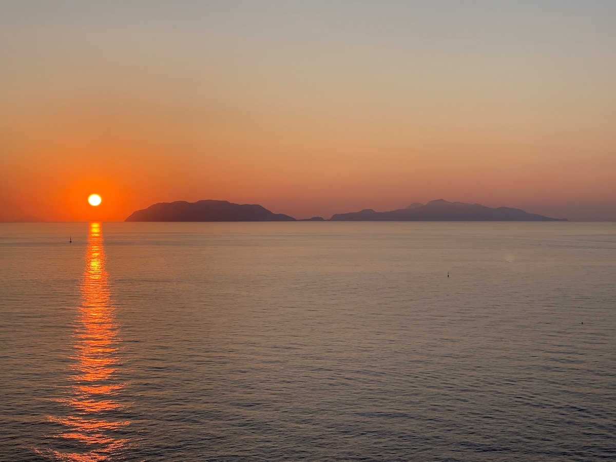 Sun Setting Behind Vulcano Seen from Milazzo